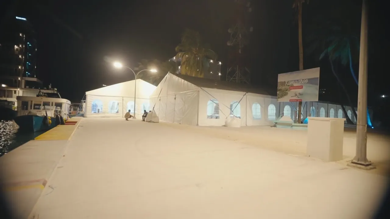 A Le Souq event tent lit up at night on Kamadhoo island