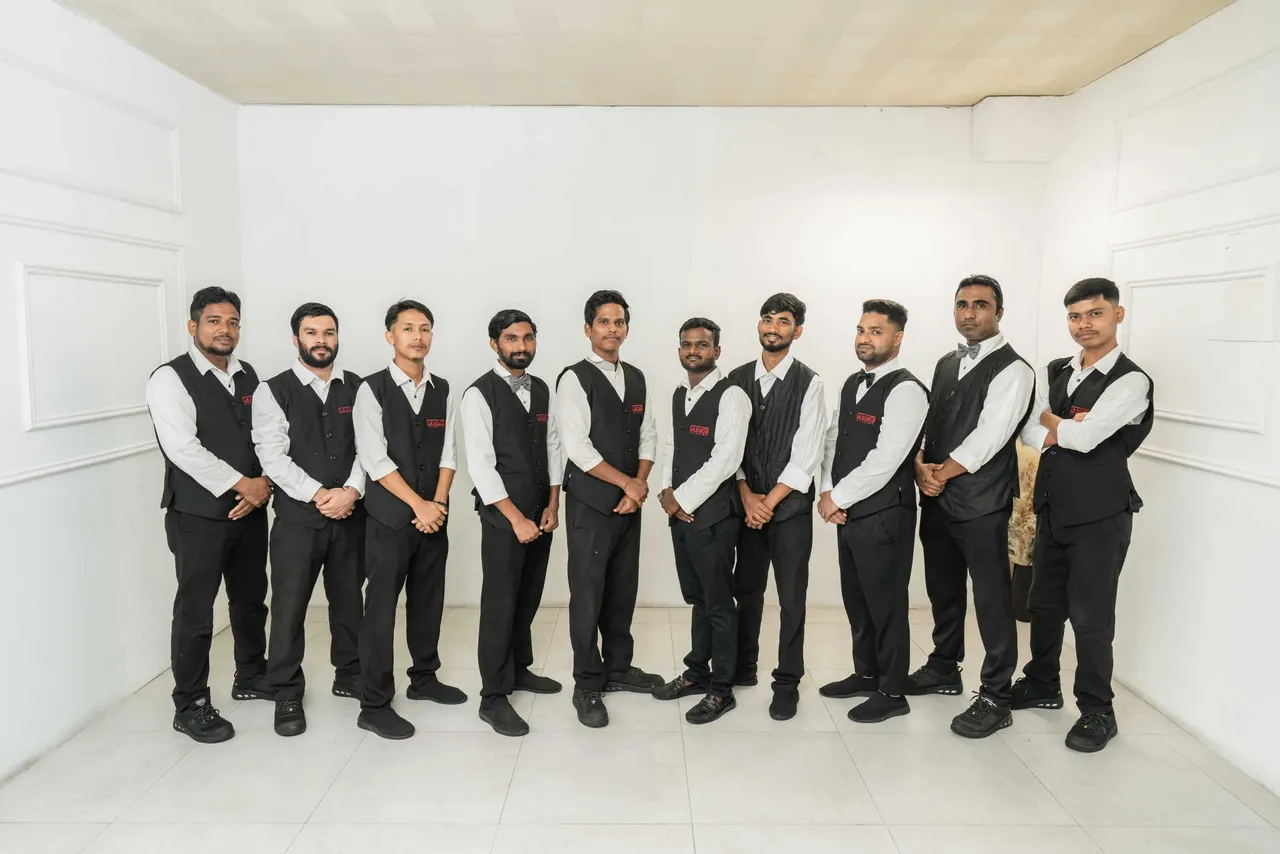 Le Souq service team in uniform
